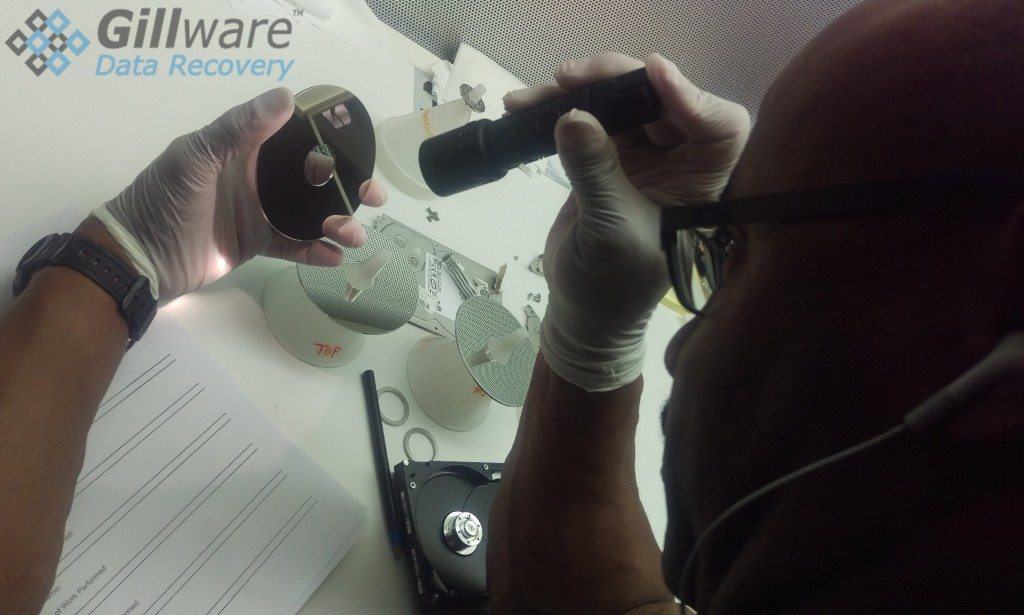Gillware's engineers do delicate work in our data recovery lab's modular cleanroom workstations