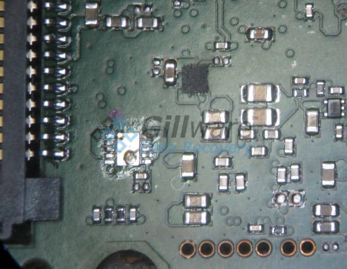 A shorted PCB under a microscope