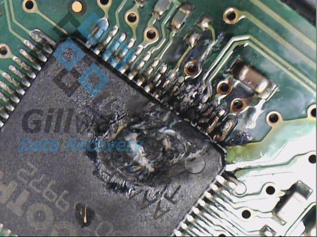 Burn damage to the PCB of a failed hard disk