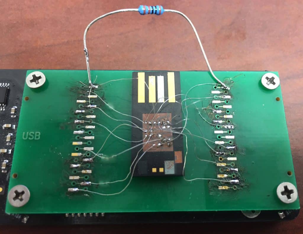 "Spiderwebbing" the chip in a monolithic USB drive