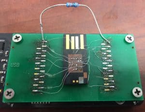 "Spiderwebbing" the chip in a monolithic USB drive