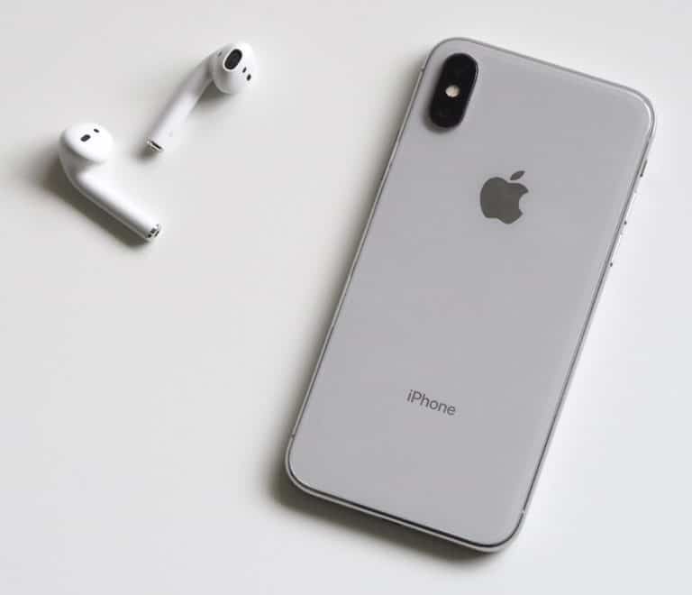 Silver iPhone with Airpods